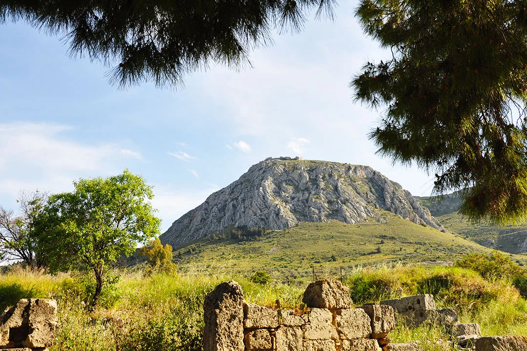 Acrocorinth hill as seen from within the archaeological site of ancient Corinth