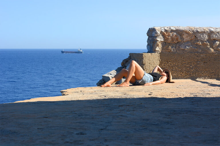 Woman resting at Cape Tainaron