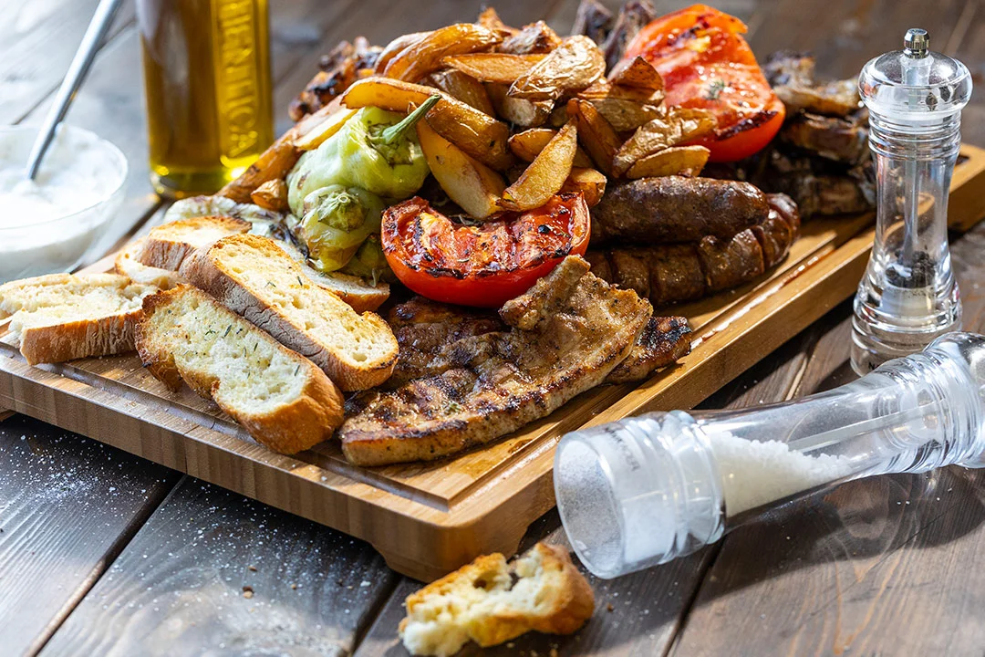 Celebrating Tsiknopempti with a plate of Greek meat variety