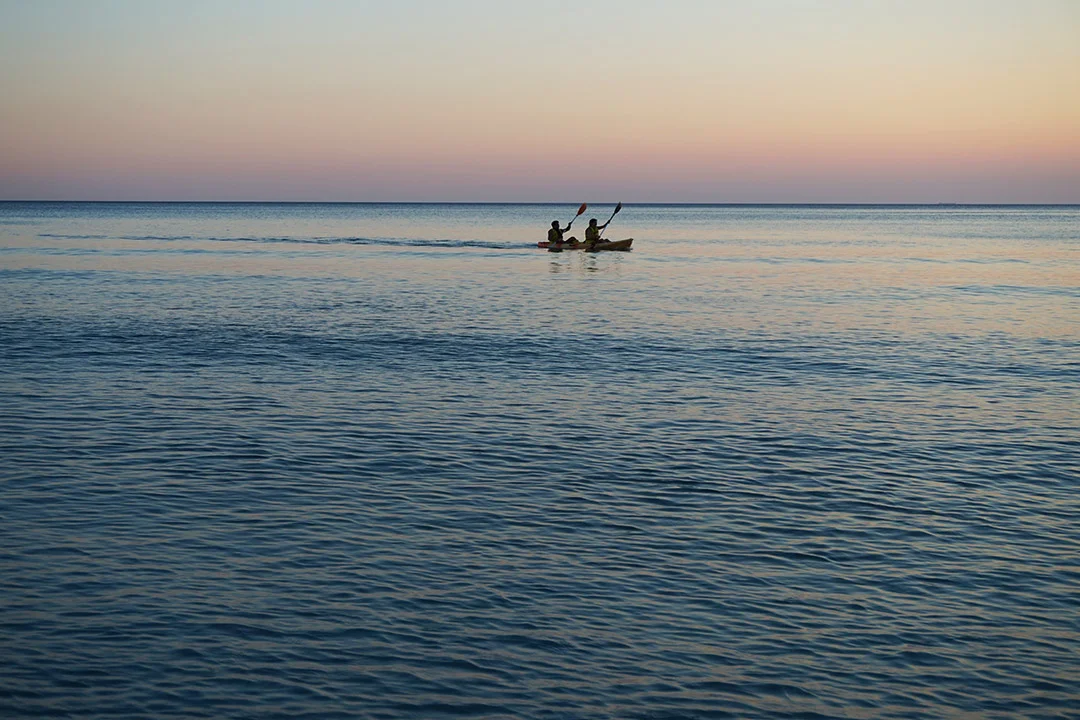 Kayaking at sunset at a Greek island